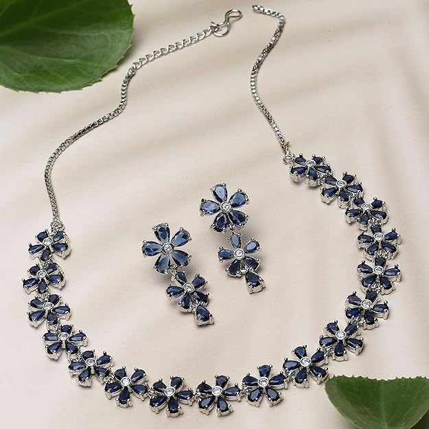 DRR Teleservices Rhodium Plated Silver Toned White American Diamond Studded Flower Shaped Jewellery Set For Girls and Women